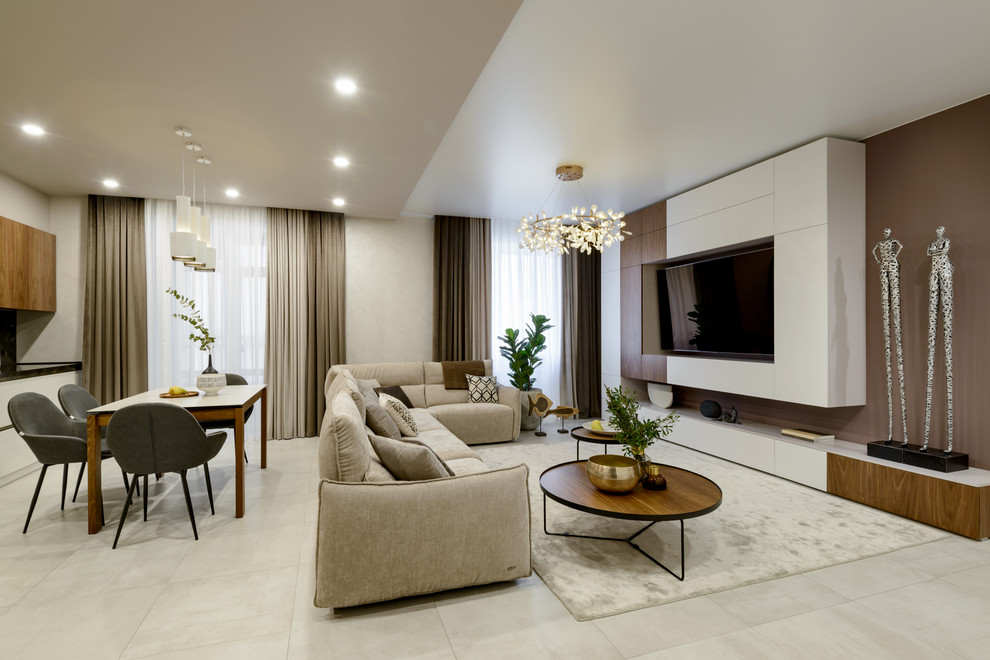 Стильный дизайн: объединенная гостиная комната в современном стиле с тюлем на окнах - последний тренд
