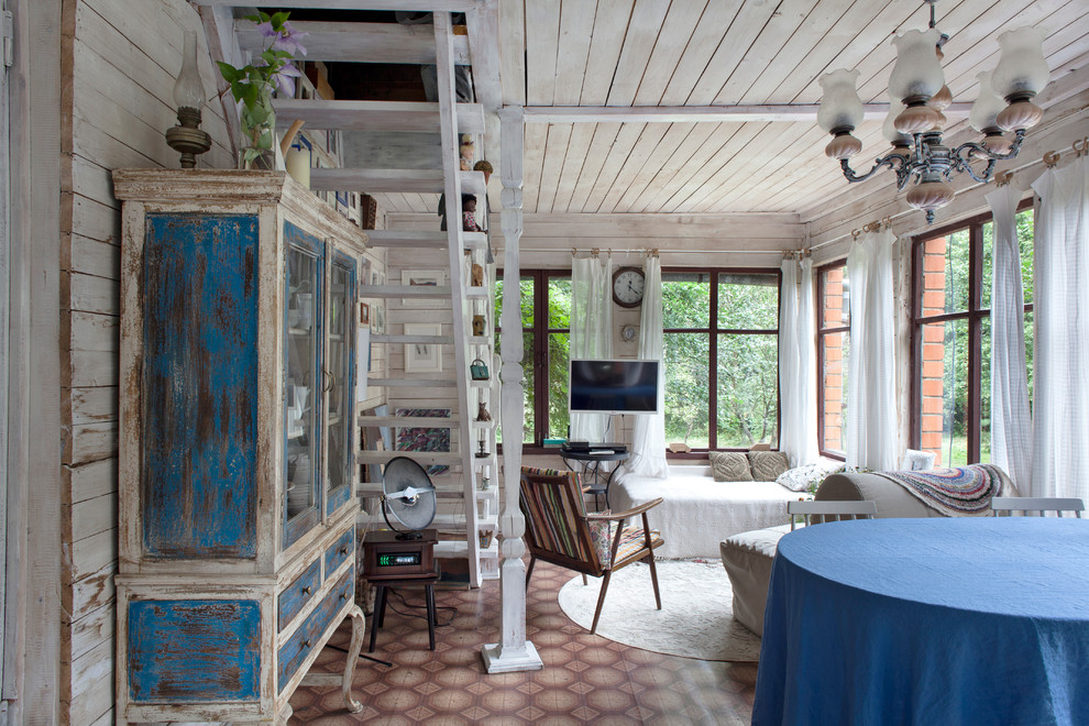 Ispirazione per un soggiorno shabby-chic style con sala formale, pareti bianche e pavimento in linoleum