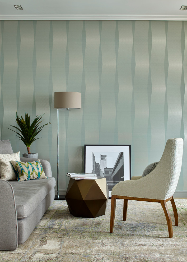 Idee per un soggiorno minimal con pareti verdi e moquette