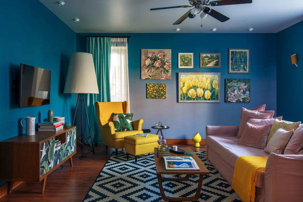 Свежая идея для дизайна: гостиная комната в современном стиле с синими стенами - отличное фото интерьера