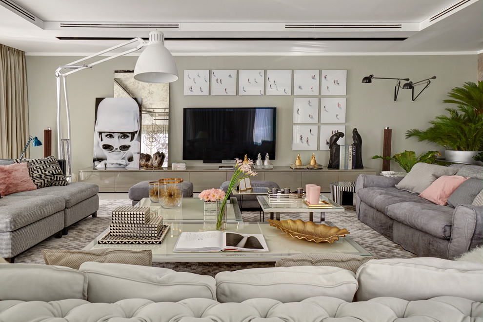 Living room - contemporary living room idea in Moscow with beige walls and a wall-mounted tv