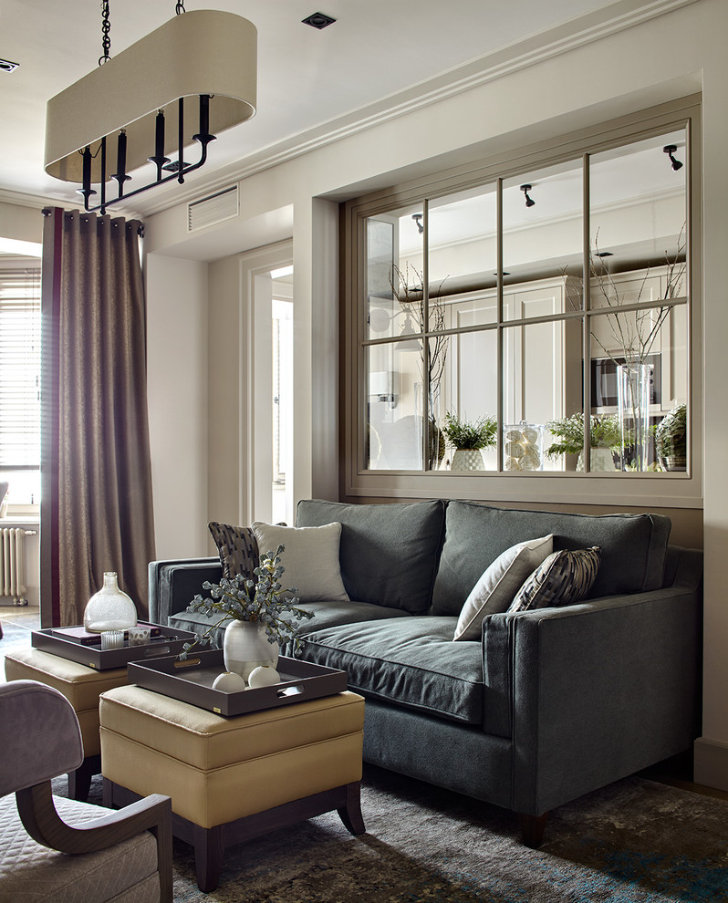 На фото: изолированная, объединенная гостиная комната среднего размера в современном стиле с серыми стенами с