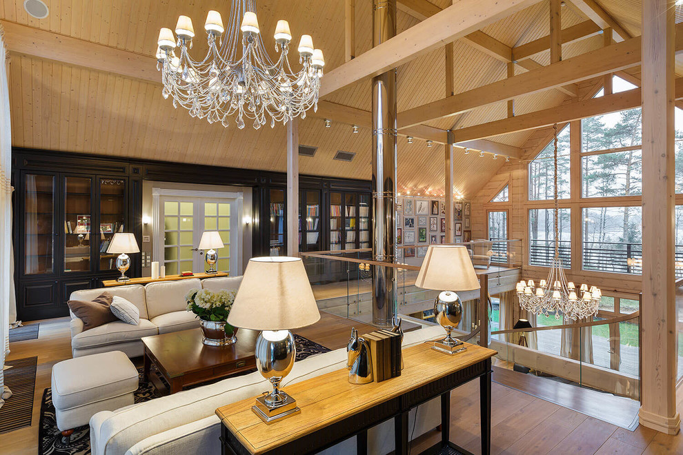 Photo of a classic mezzanine living room in Saint Petersburg with beige walls and light hardwood flooring.