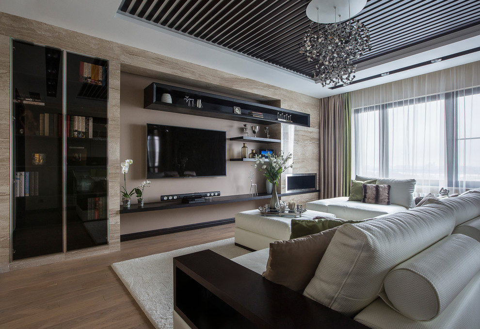 Medium sized contemporary formal open plan living room in Moscow with beige walls, medium hardwood flooring, a wall mounted tv and beige floors.