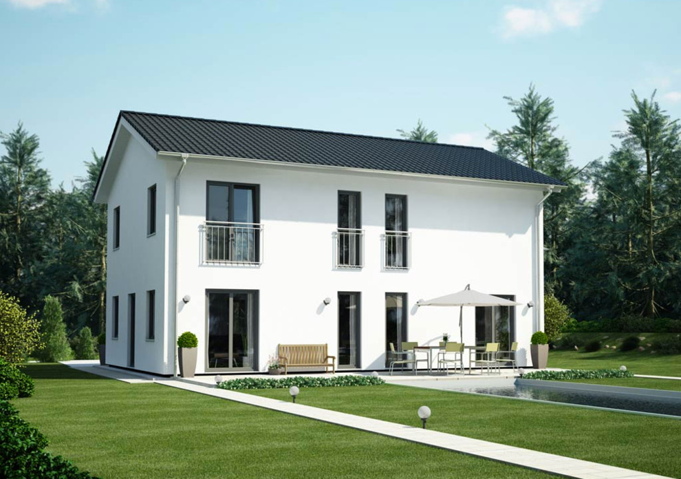 Источник вдохновения для домашнего уюта: двухэтажный, белый дом в стиле неоклассика (современная классика) с двускатной крышей
