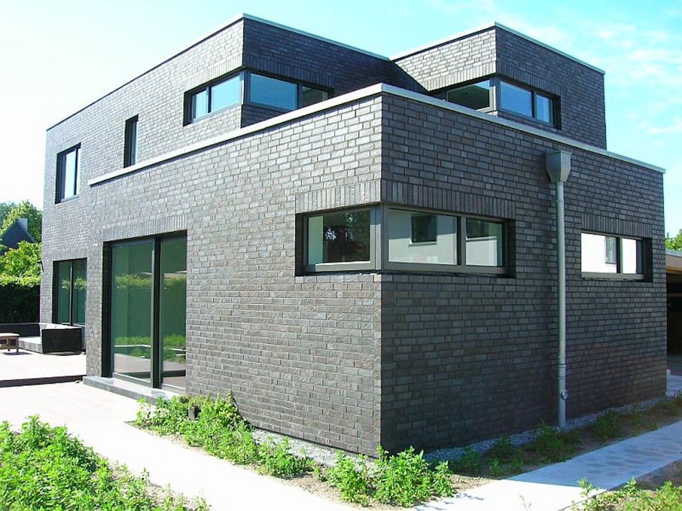 Idée de décoration pour une façade de maison design.