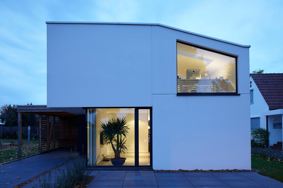 Design ideas for a small and white contemporary two floor house exterior in Dusseldorf.