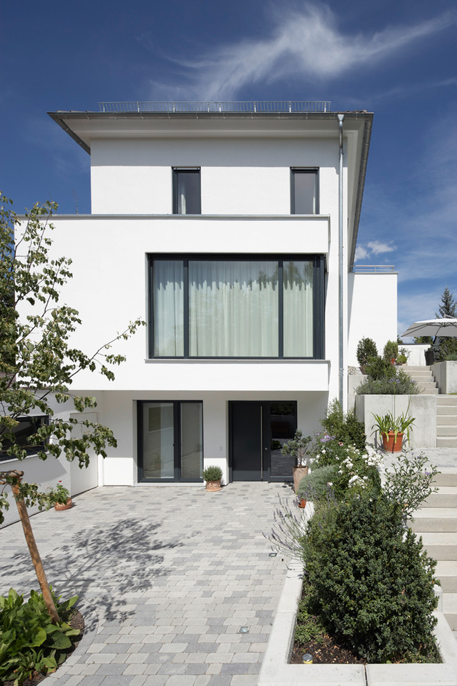 Example of a mid-sized trendy exterior home design in Stuttgart