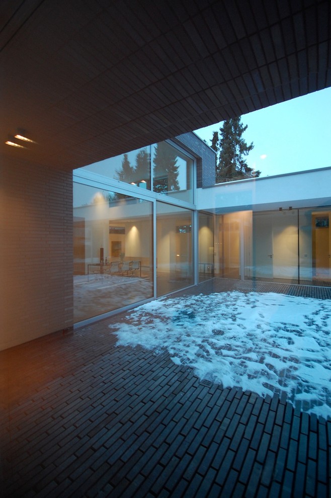 Diseño de fachada minimalista con tejado plano