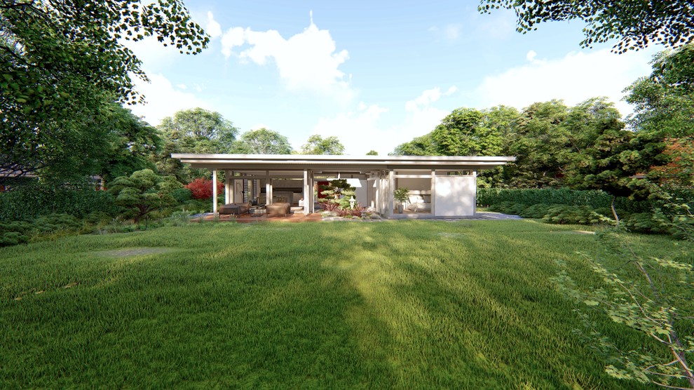 На фото: большой, одноэтажный, деревянный, серый частный загородный дом в восточном стиле с плоской крышей и зеленой крышей с