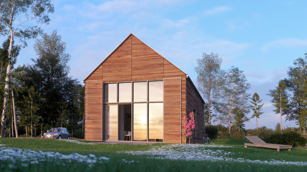 Imagen de fachada marrón de estilo de casa de campo de tamaño medio de dos plantas con revestimiento de vidrio y tejado a dos aguas