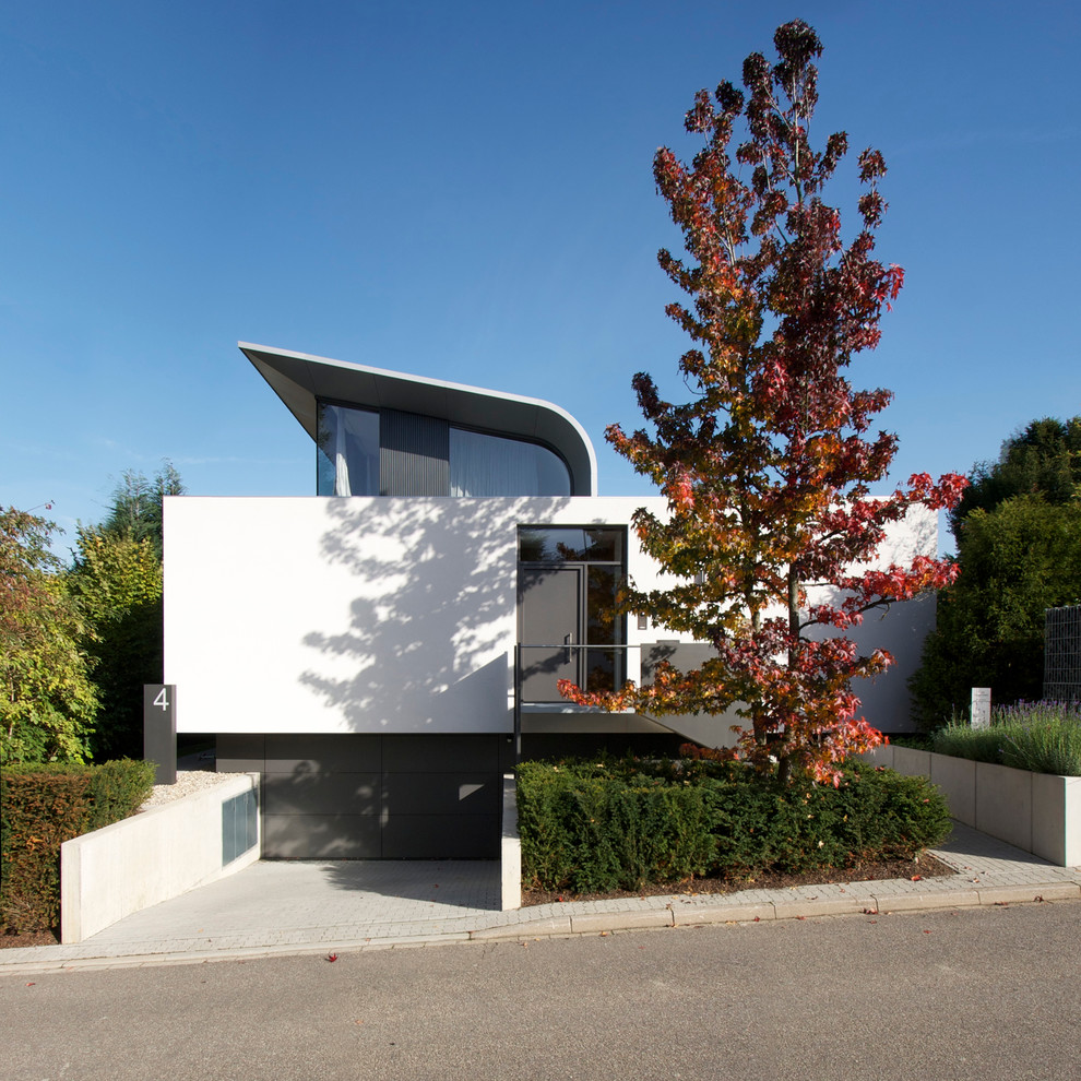 Ispirazione per la facciata di una casa bianca contemporanea a due piani di medie dimensioni
