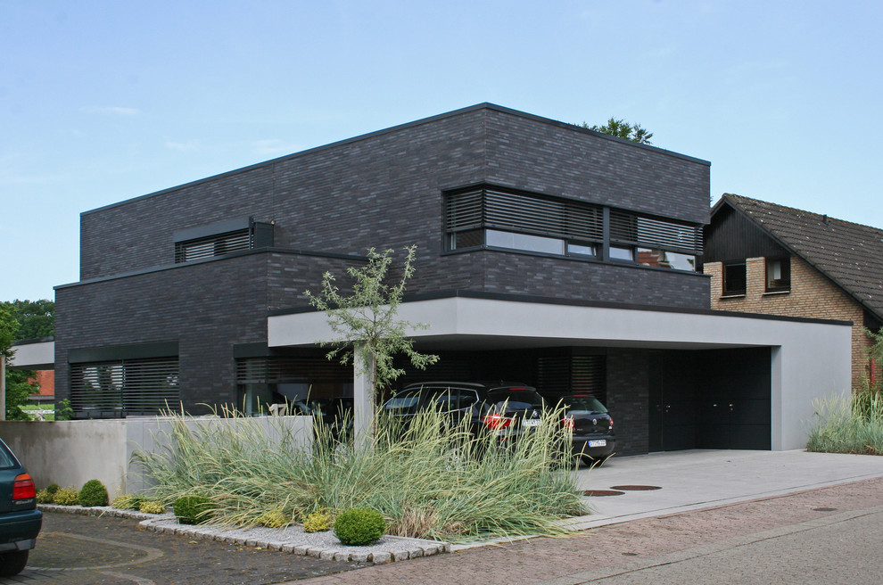 Modernes Haus mit grauer Fassadenfarbe in Sonstige