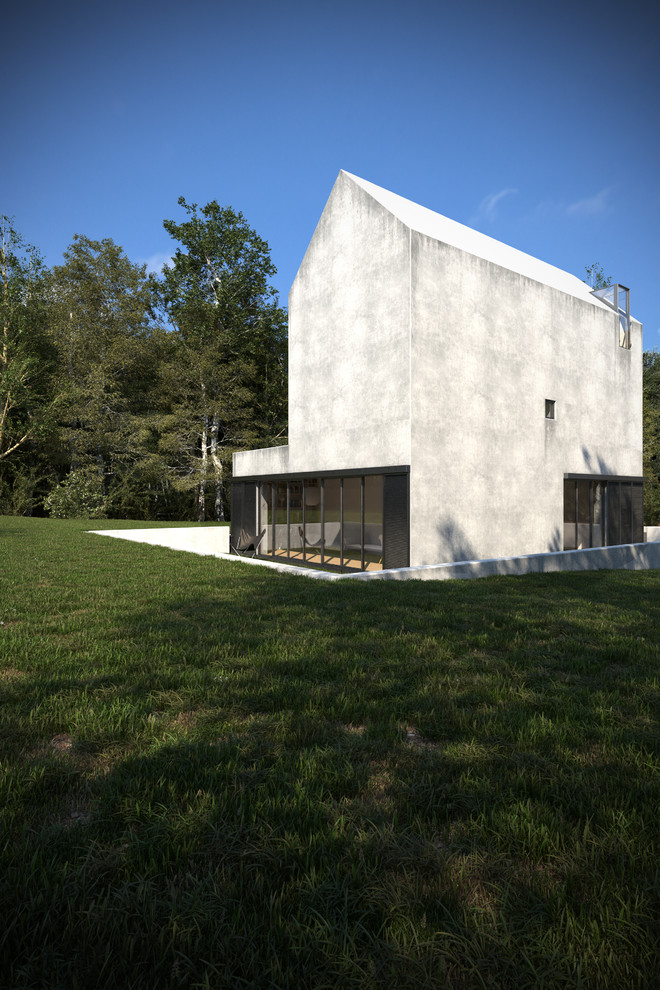Пример оригинального дизайна: трехэтажный, белый дом среднего размера в стиле модернизм с облицовкой из бетона и двускатной крышей