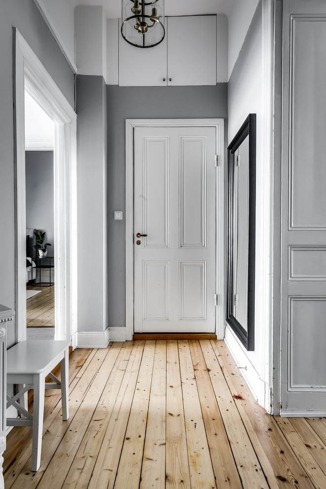 Hallway - traditional hallway idea in Stockholm with gray walls