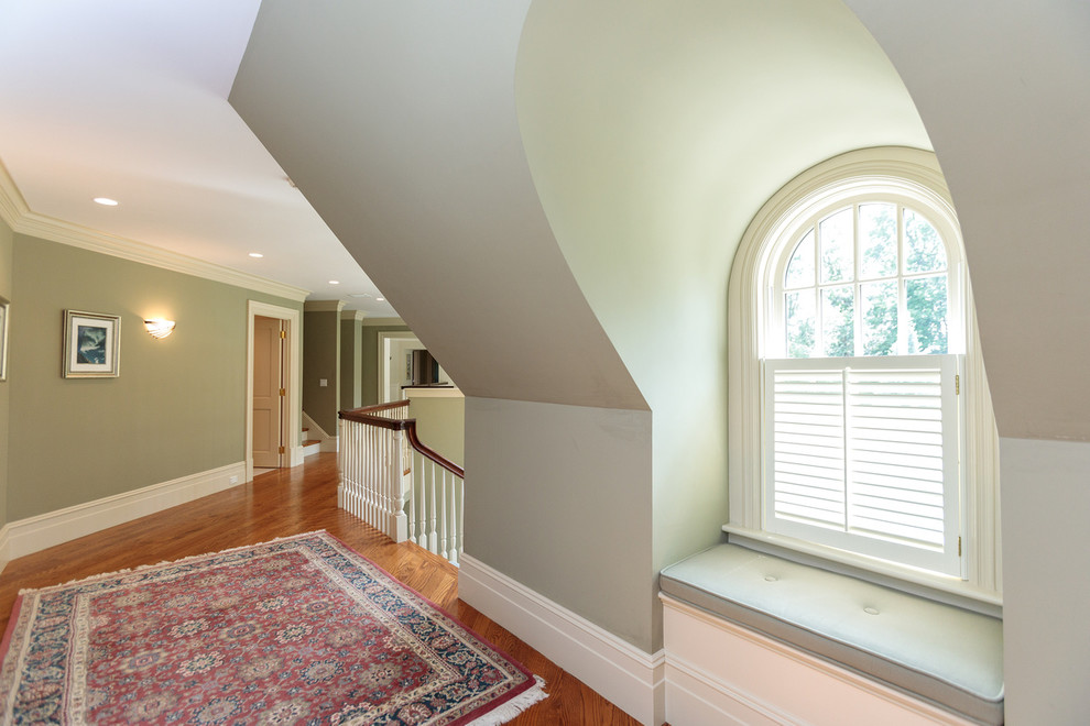 Huge elegant carpeted and beige floor hallway photo in Boston with beige walls