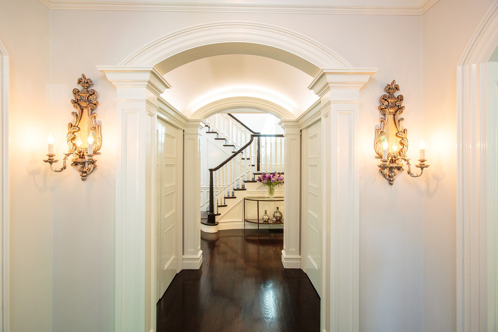 Inspiration for a victorian dark wood floor hallway remodel in Boston with white walls