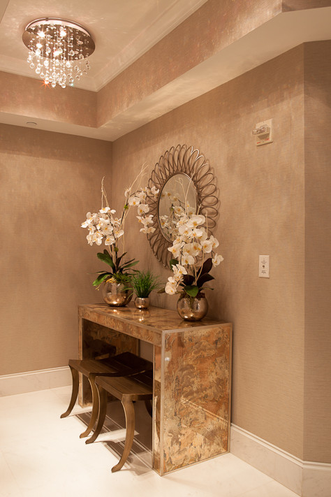 Inspiration for a mid-sized contemporary marble floor hallway remodel in Miami with beige walls