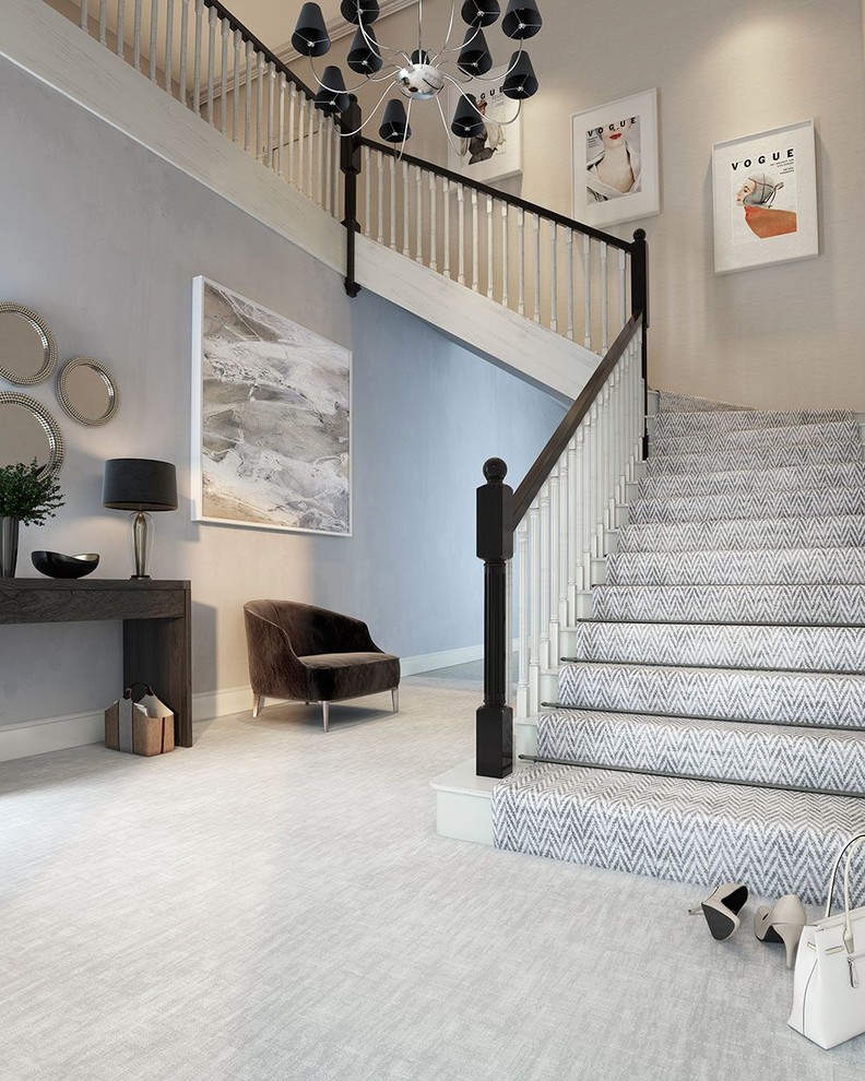 Inspiration pour un couloir design avec moquette et un sol gris.