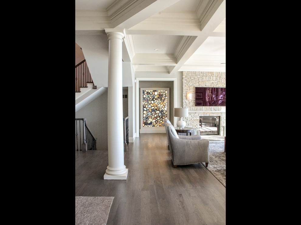 Hallway - large coastal medium tone wood floor and brown floor hallway idea in Other with gray walls