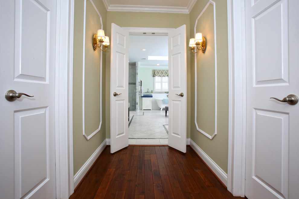 Hallway - mid-sized traditional dark wood floor and brown floor hallway idea in Louisville with green walls