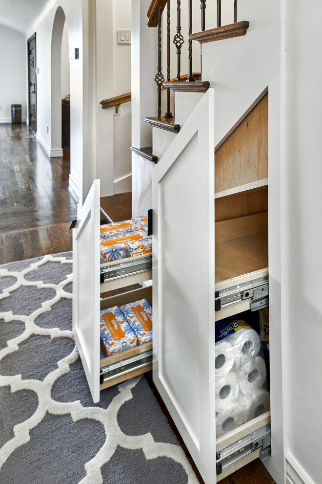 Inspiration for a mid-sized transitional medium tone wood floor and brown floor hallway remodel in San Francisco with white walls