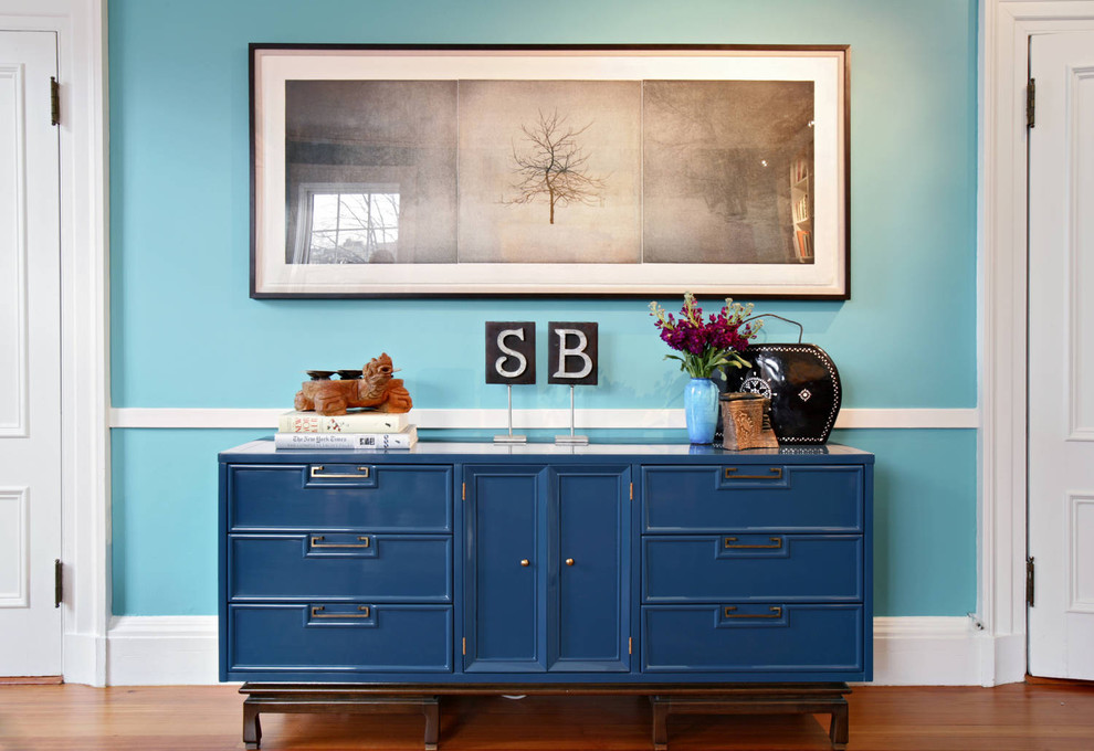 Inspiration for an eclectic hallway remodel in Boston with blue walls