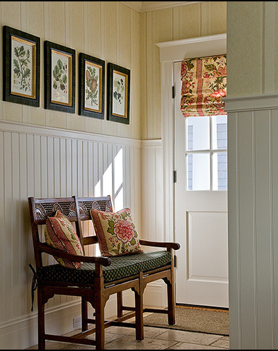 Inspiration for a small timeless ceramic tile hallway remodel in Boston with beige walls