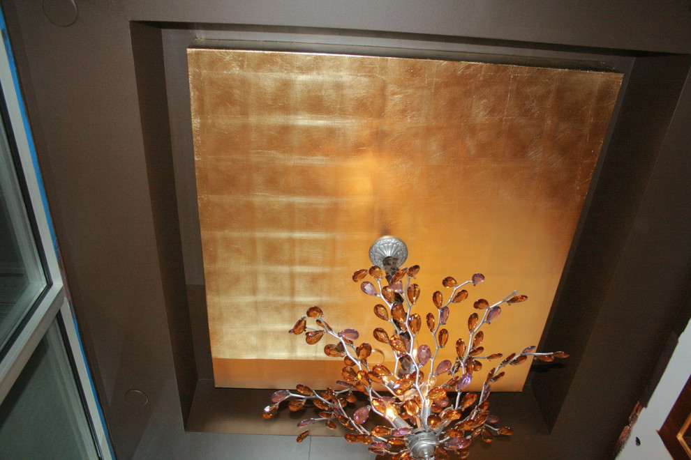 Example of a small trendy hallway design in New York with brown walls