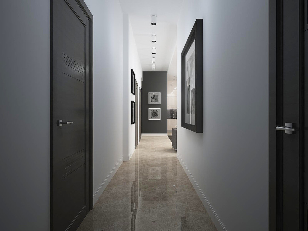 Hallway - small modern hallway idea in New York with white walls