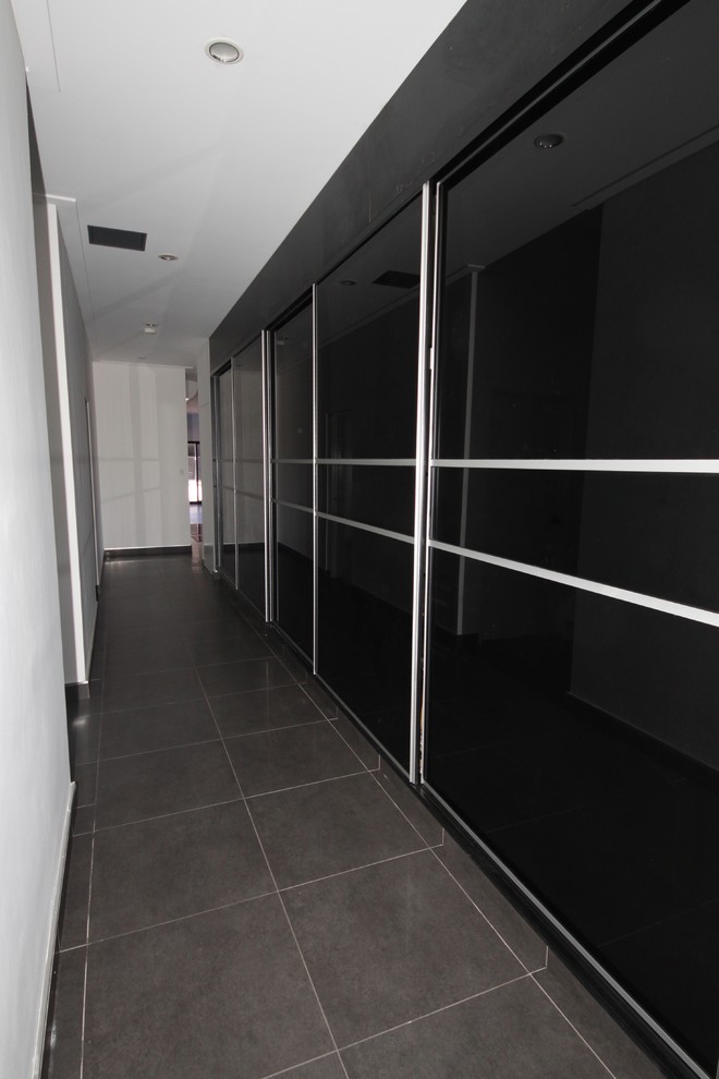 Hallway - huge contemporary hallway idea in Darwin
