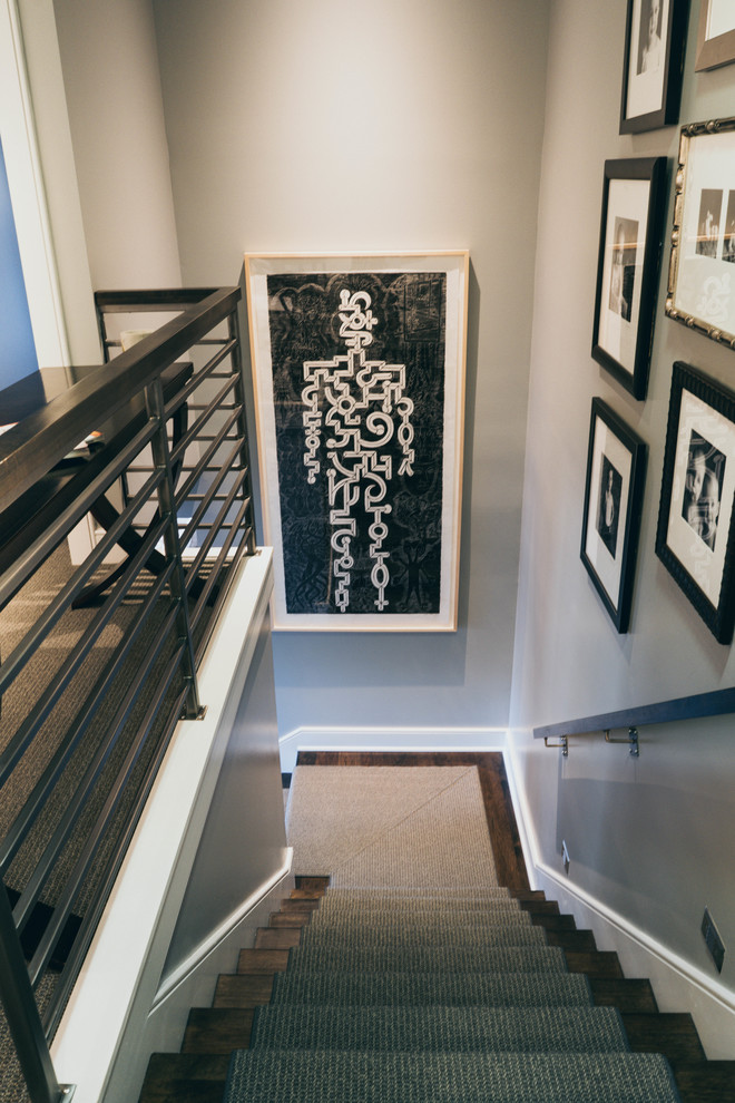 Inspiration for a mid-sized transitional staircase remodel in Omaha