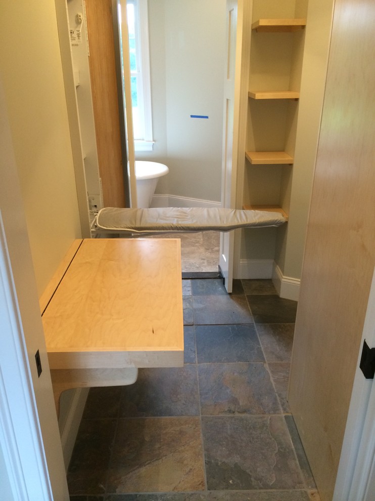 Example of a mid-sized arts and crafts ceramic tile and gray floor hallway design in Boston with gray walls
