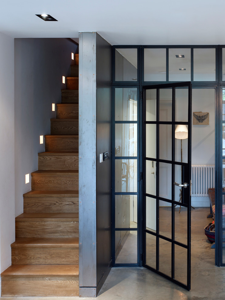 Hallway - contemporary hallway idea in Essex with gray walls