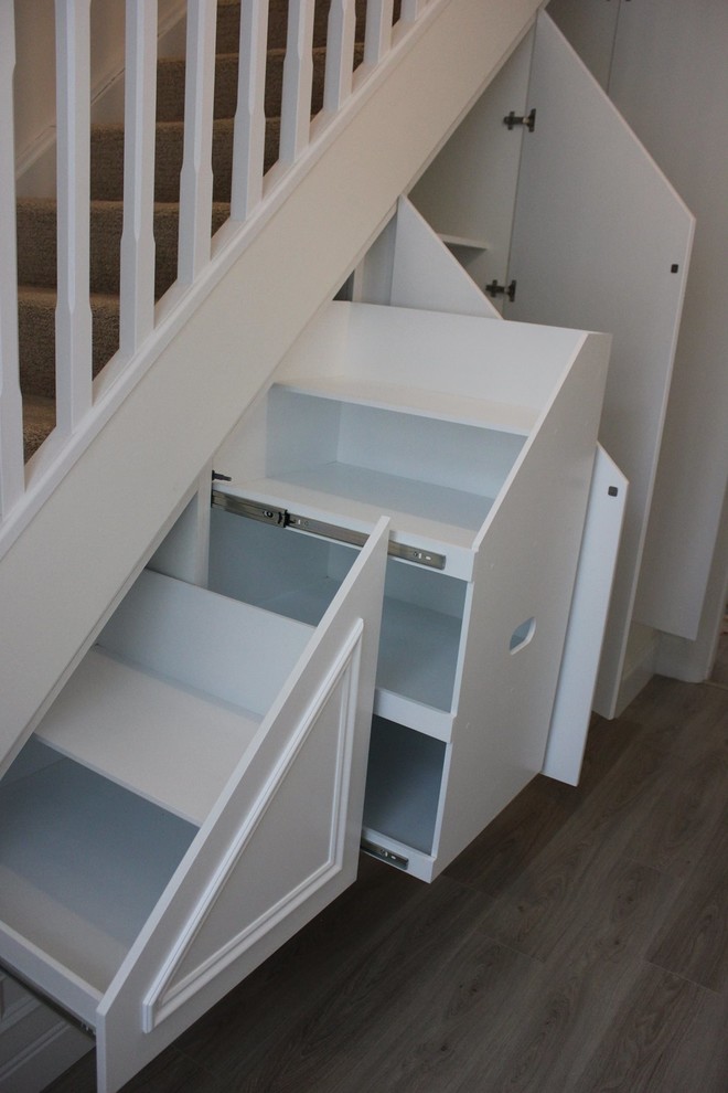 custom designed under stairs storage unit Traditional Staircase