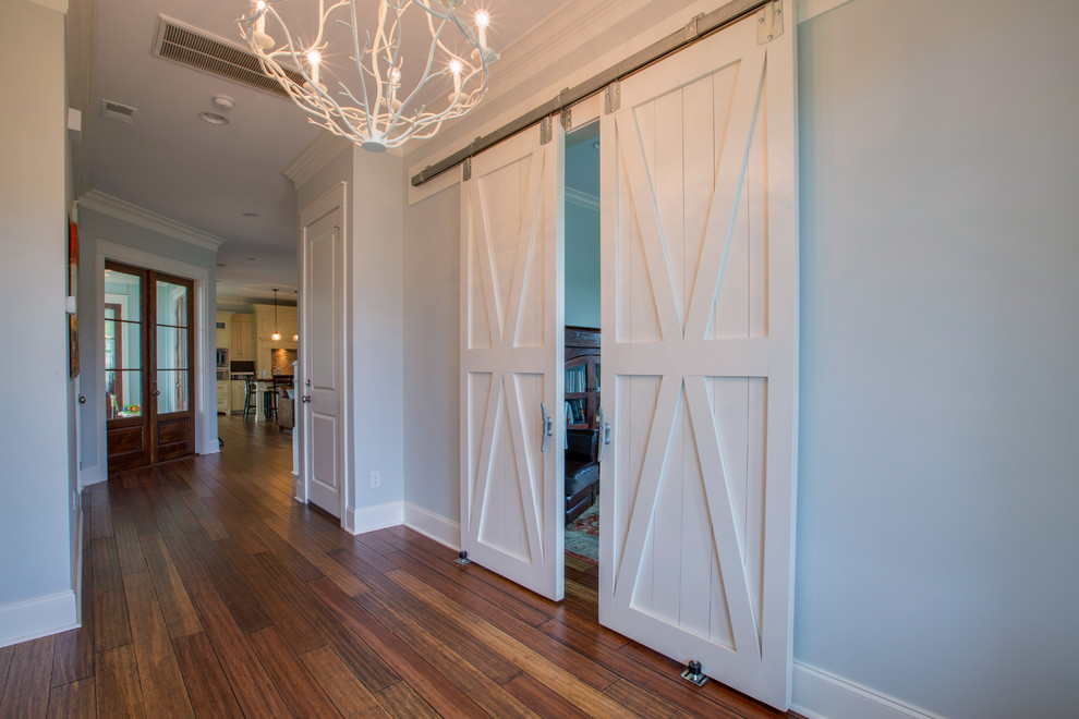 Example of a country hallway design in Charleston with blue walls