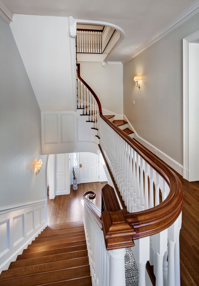 Large elegant staircase photo in Other