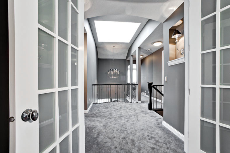 Inspiration for a contemporary hallway remodel in Calgary