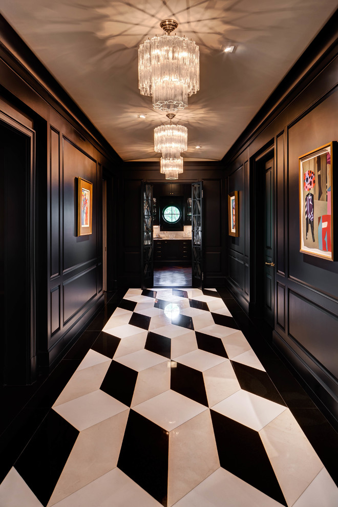 Example of a transitional porcelain tile hallway design in Houston with black walls
