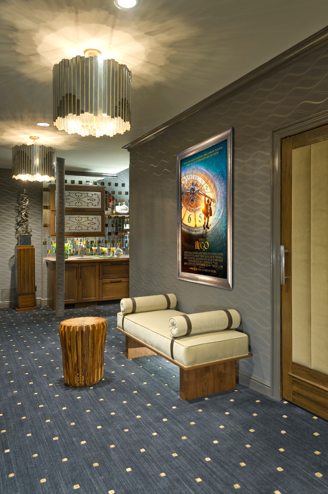 Transitional carpeted hallway photo in New York with gray walls