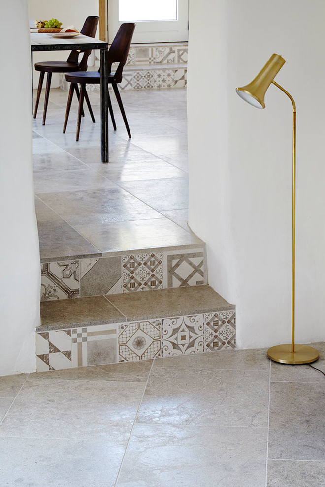 Example of a minimalist limestone floor hallway design in Other