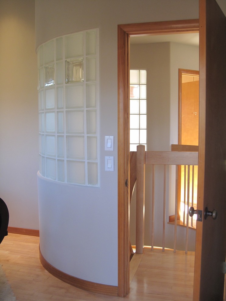 Small zen light wood floor hallway photo in San Francisco with beige walls