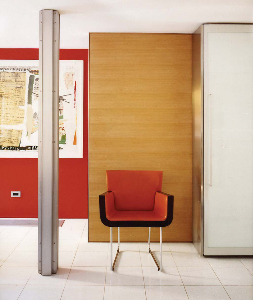 Inspiration for a contemporary hallway remodel in New York with red walls