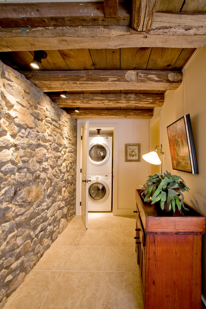 Example of a large country hallway design in Philadelphia with white walls