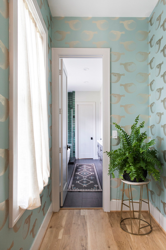 Inspiration for a transitional wallpaper hallway remodel in Houston