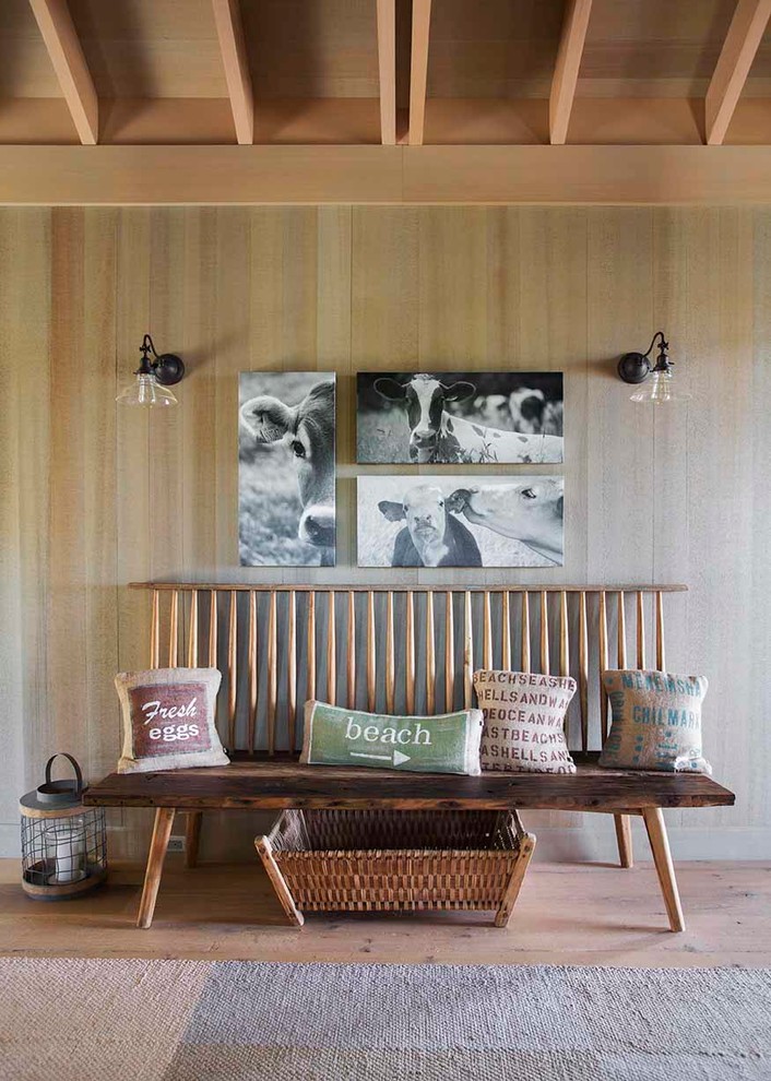 Inspiration for a coastal light wood floor hallway remodel in Boston