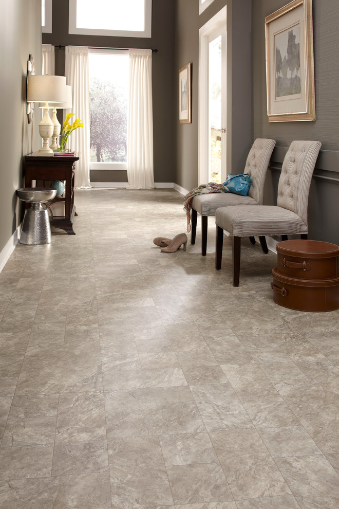 Example of a trendy ceramic tile hallway design in Other