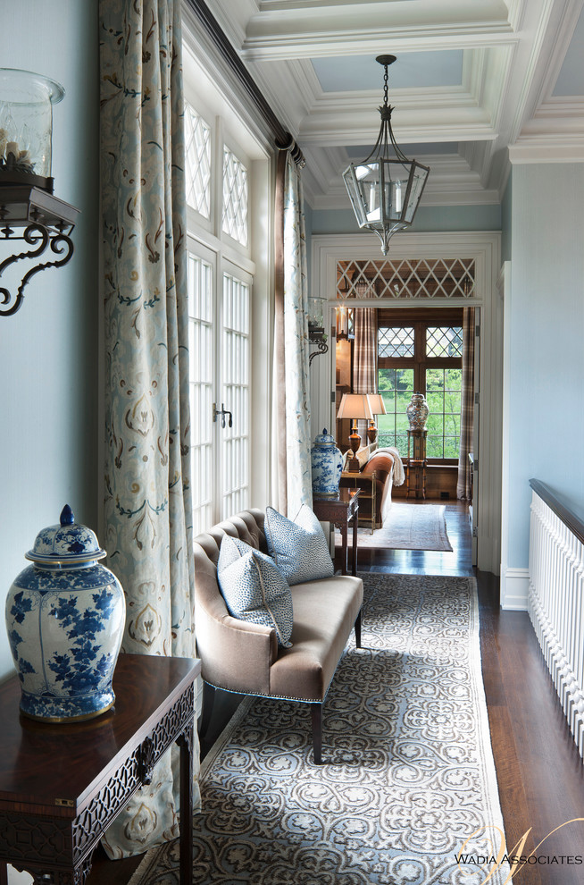 Inspiration for a timeless hallway remodel in New York with blue walls