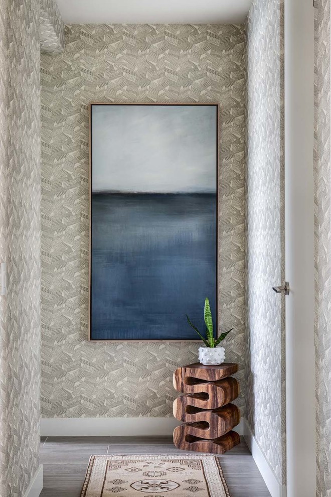 Mid-sized beach style gray floor and dark wood floor hallway photo in Orange County with gray walls