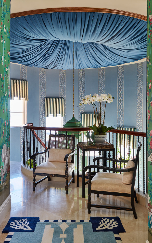 Inspiration for an eclectic hallway remodel in Miami with blue walls